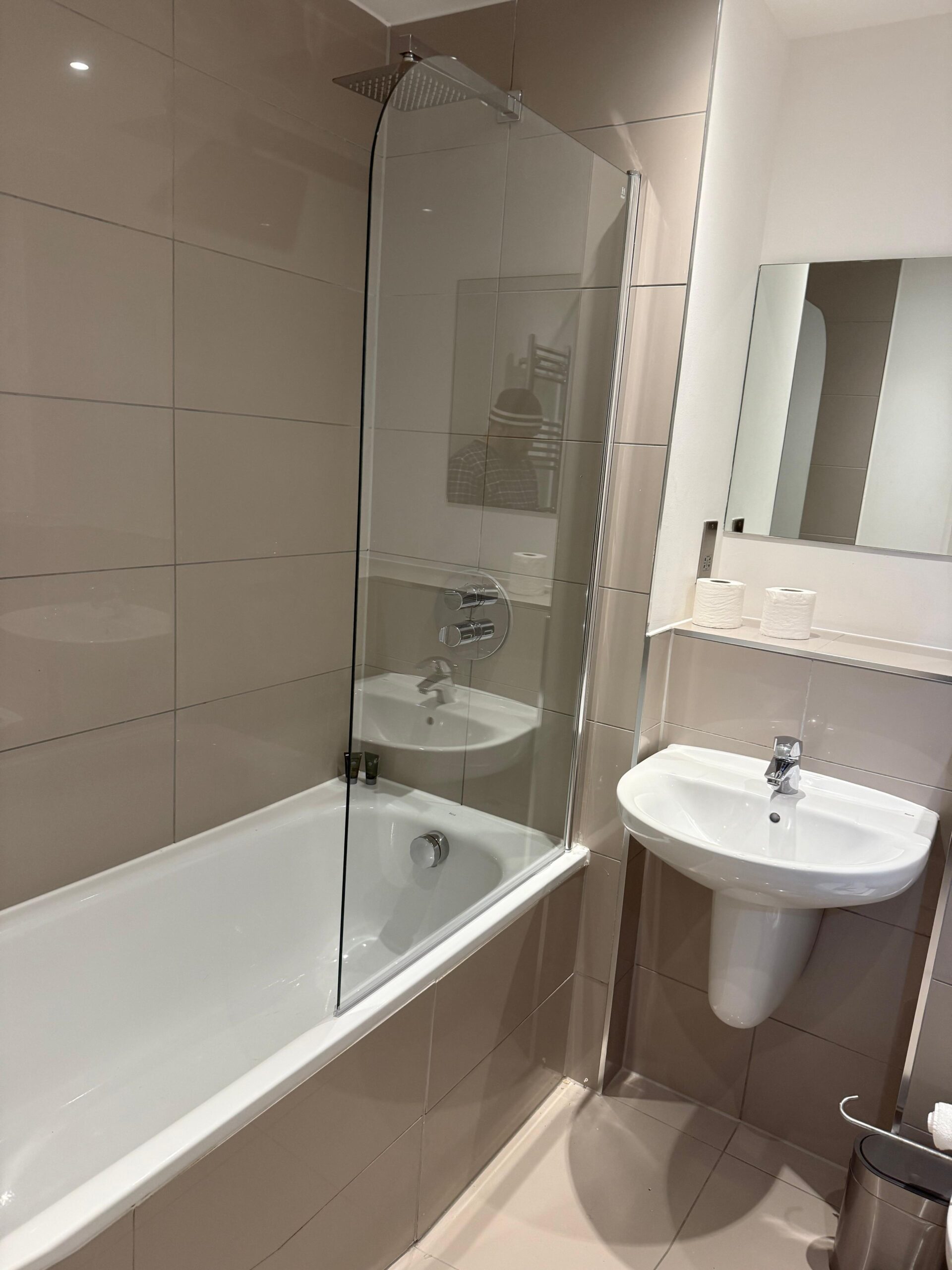 Completed bathroom renovation with premium tiling